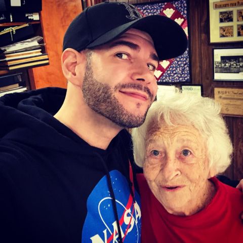 Steve Gonsalves poses a photo with his grandmother.
